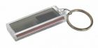 Brelok "Solar" z błyszczącą pod wpływem światła powierzchnią na Twoje logo (47 x 19 mm).