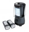 Kempingowa lampa TRANSFORMER : 2 lekkie okna z wbudowanymi wymiennymi latarkami, chowany uchwytem, ładowana poprzez złącze 230 V lub 12 V (zapalniczka), gumowany włącznik/ wyłącznik.