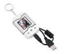 Brelok PLAY IT : z cyfrową ramką na zdjęcia, pojemność: 1 MB (ok. 35 zdjęć), wyświetla datę i godzinę, funkcja alarmu, dwie gry, kabel USB (długość ok.. 123 cm), wykonany z solidnego tworzywa sztucznego.