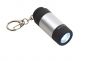 Latarka LED CHARGER , z mozliwością ładowania: z brelokiem na klucze i wbudowanym portem USB do ładowania.