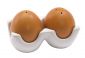 Zestaw do soli i pieprzu "Funny eggs" , naczynia w kształcie jajek na porcelanowej podkładce, pakowane w pudełko.