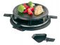 Grill stołowy "Raclette" z zakrytym grillem i 6 mniejszymi patelniami o izolowanych rączkach, odpowiedni dla 6 osób.